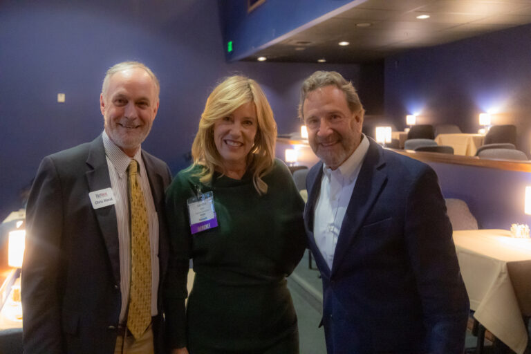 Three guests pose at the 2025 Most-Influential Business Leaders reception