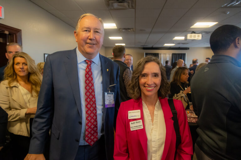 Two guests pose at the 2025 Most-Influential Business Leaders reception