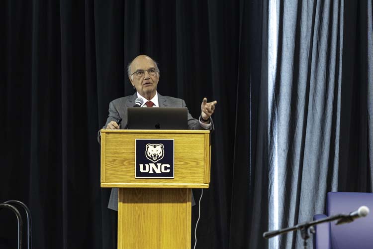 The keynote speaker at the podium at the 2026 Northern Colorado Economic Forecast