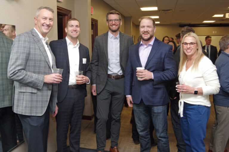 Five guests pose at the 2024 Book of Lists Launch Party reception