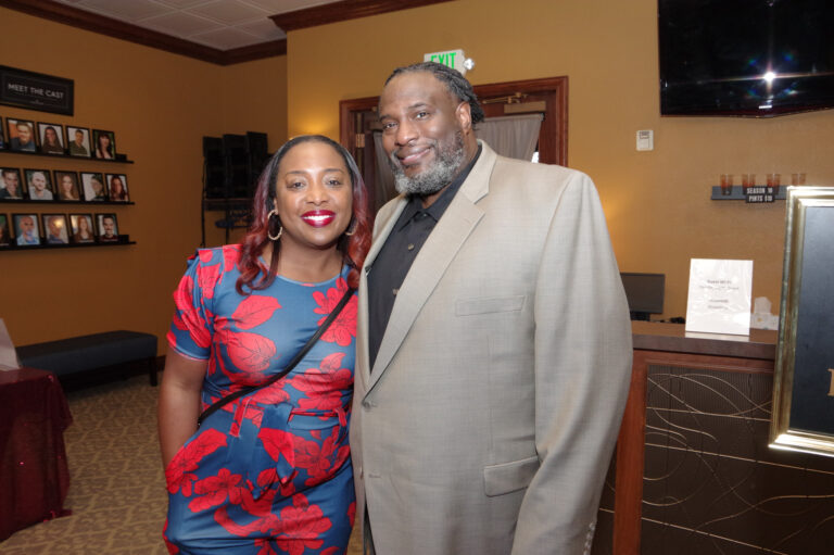 Two guests pose at the 2024 Book of Lists Launch Party reception