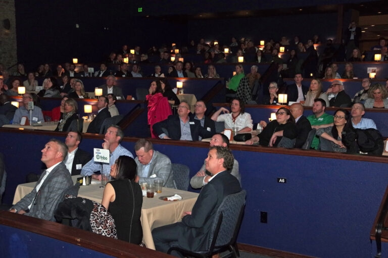 The audience seated at tables during the 2024 Book of Lists Launch Party program