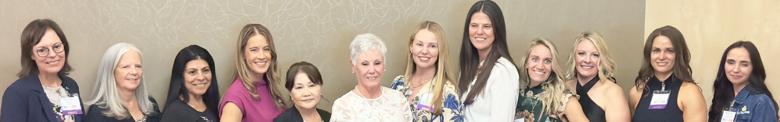 The 2025 Women of Distinction honorees standing together at the awards event